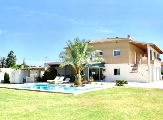 Foto 1 de Chalet en alquiler en Oliva Playa de 4 habitaciones con terraza y piscina