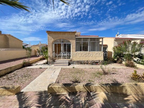Foto 1 de Casa adosada en venta en San Fulgencio de 2 habitaciones con terraza y piscina