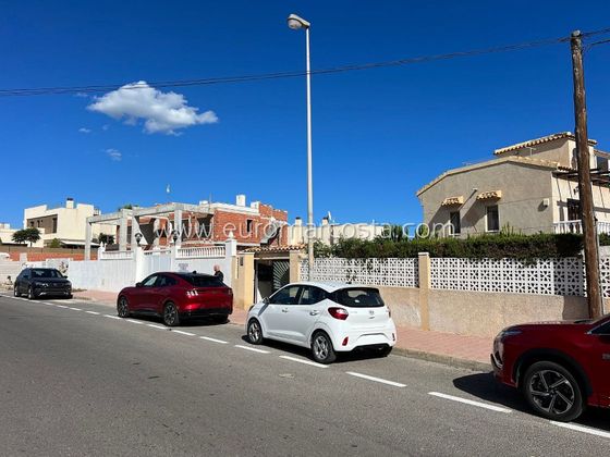 Foto 1 de Venta de casa adosada en Torrelamata - La Mata de 2 habitaciones con terraza y piscina