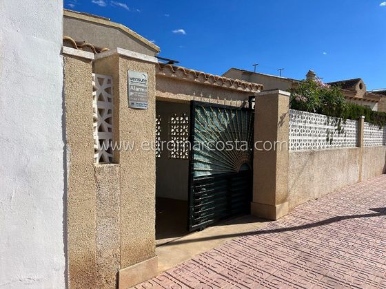 Foto 2 de Venta de casa adosada en Torrelamata - La Mata de 2 habitaciones con terraza y piscina