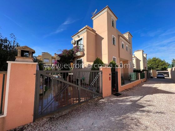 Foto 1 de Casa adosada en venta en Los Balcones - Los Altos del Edén de 4 habitaciones con terraza y piscina