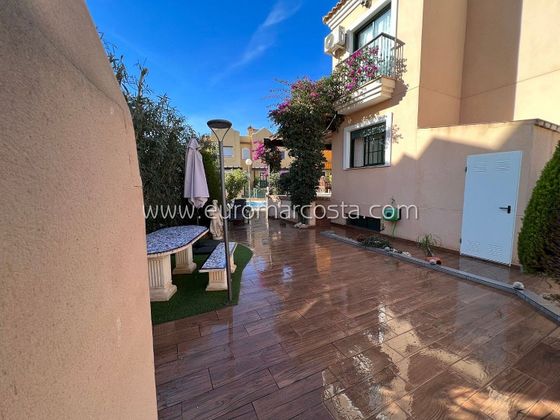 Foto 2 de Casa adossada en venda a Los Balcones - Los Altos del Edén de 4 habitacions amb terrassa i piscina