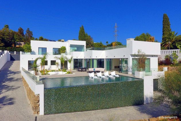 Foto 1 de Casa adossada en venda a Elviria de 5 habitacions amb terrassa i piscina