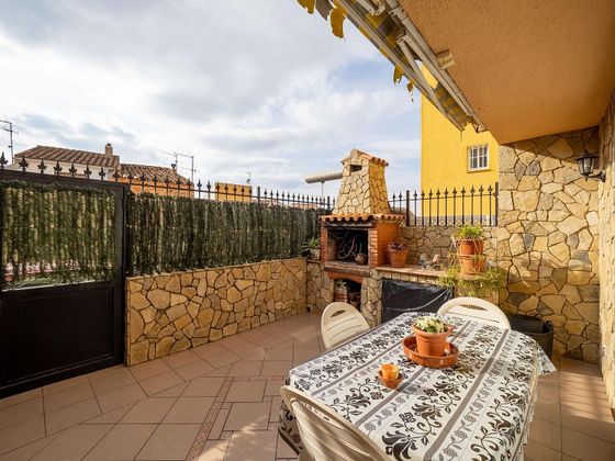Foto 1 de Venta de casa adosada en calle Juan de la Cosa de 4 habitaciones con terraza y piscina