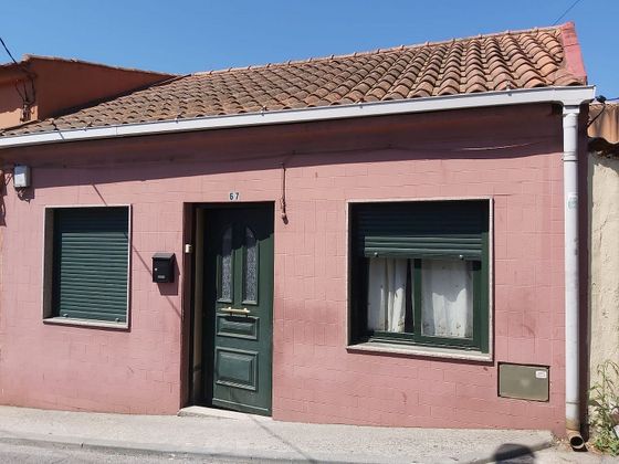 Foto 1 de Casa adosada en venta en calle Espiñeiro de 2 habitaciones con terraza y piscina