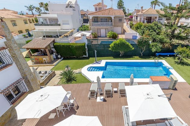 Foto 2 de Venta de chalet en Caleta de Vélez de 7 habitaciones con terraza y piscina
