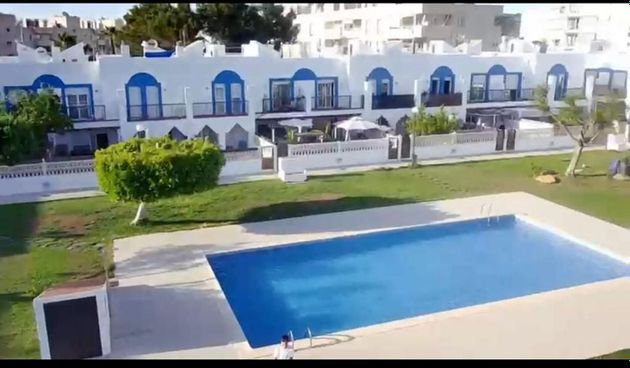 Foto 1 de Dúplex en venta en San Agustín - Cala de Bou de 4 habitaciones con terraza y piscina
