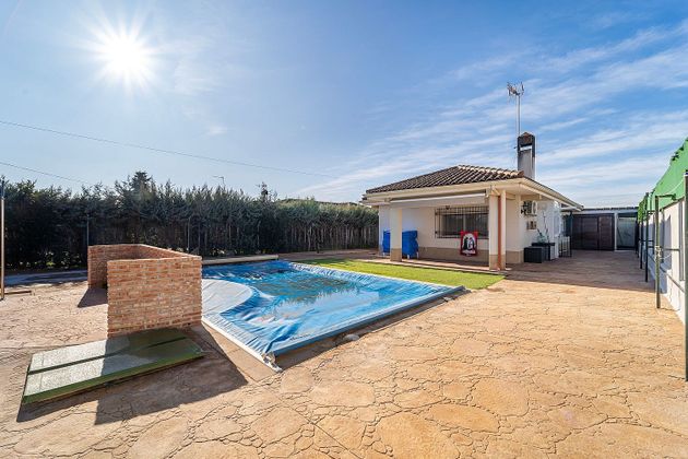 Foto 1 de Chalet en venta en Sevilla la Nueva de 3 habitaciones con terraza y piscina