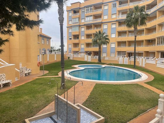 Foto 1 de Casa adossada en venda a Los Arenales del Sol de 2 habitacions amb terrassa i piscina