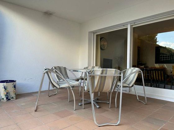 Foto 2 de Venta de casa adosada en La Fosca-Cala Margarida de 4 habitaciones con garaje y jardín