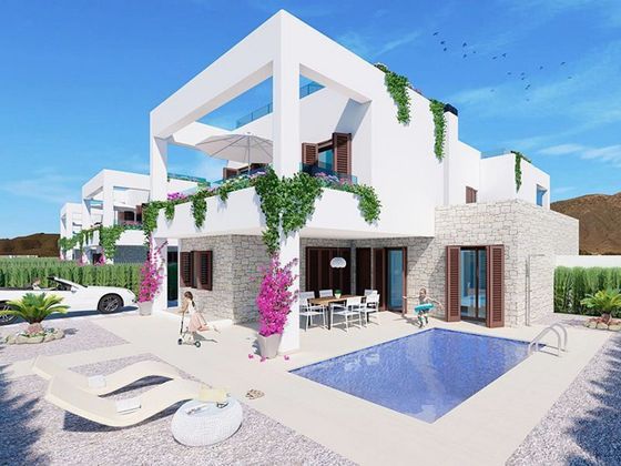 Foto 1 de Casa adossada en venda a San Juan de los Terreros de 2 habitacions amb terrassa i piscina