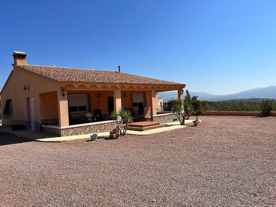 Foto 1 de Venta de casa rural en Castalla de 3 habitaciones con terraza y piscina