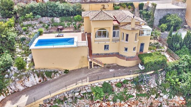 Foto 1 de Xalet en venda a urbanización Monte Solana de 3 habitacions amb terrassa i piscina