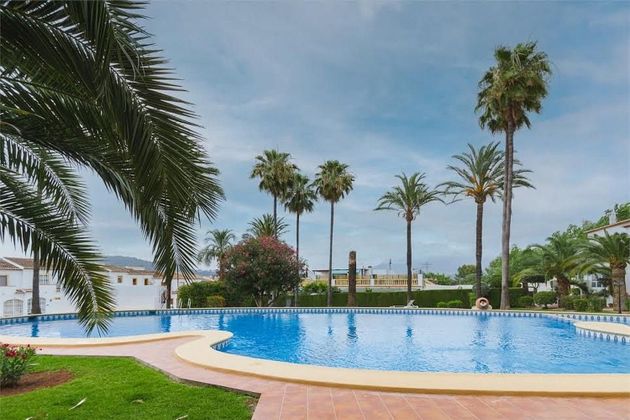 Foto 1 de Casa adossada en venda a avenida Del Garrofer de 3 habitacions amb terrassa i piscina