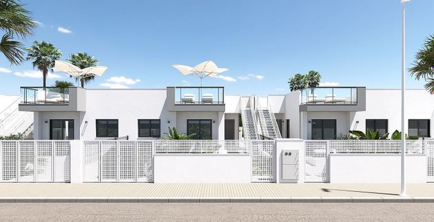 Foto 2 de Casa adosada en venta en Poblets (els) de 3 habitaciones con terraza y piscina