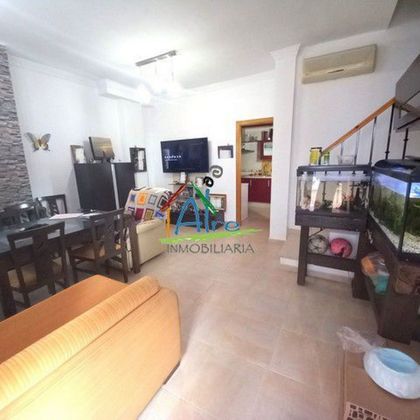 Foto 2 de Casa adosada en venta en Almonte de 3 habitaciones con garaje y aire acondicionado