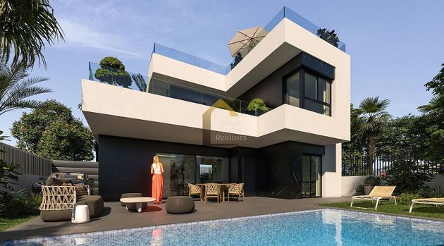 Foto 1 de Casa en venda a Rojales de 3 habitacions amb piscina i jardí