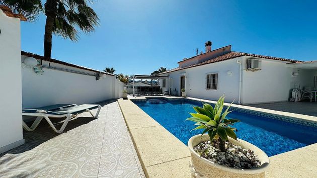 Foto 1 de Casa en venda a Alfaz del Pi Pueblo-Urbanizaciones de 5 habitacions amb terrassa i piscina