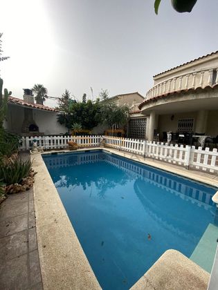 Foto 1 de Casa adosada en venta en Ardiaca - La Llosa de 4 habitaciones con terraza y piscina