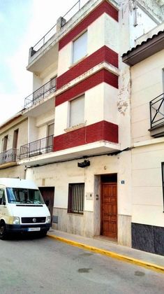 Foto 1 de Casa adossada en venda a calle Gandia de 7 habitacions amb terrassa i garatge