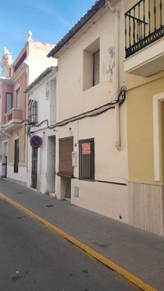 Foto 2 de Casa en venda a calle Gandia de 6 habitacions amb terrassa i garatge