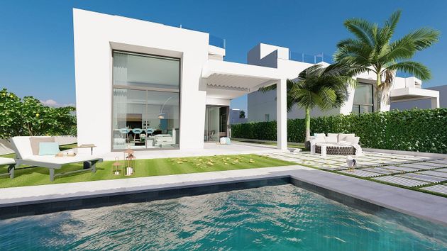 Foto 2 de Casa adossada en venda a Cala de Finestrat de 4 habitacions amb terrassa i piscina
