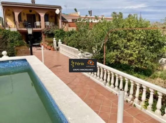 Foto 1 de Venta de chalet en Santa Rita de 6 habitaciones con terraza y piscina