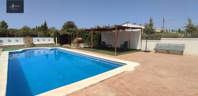 Foto 2 de Chalet en venta en Cañada Rosal de 4 habitaciones con piscina y jardín