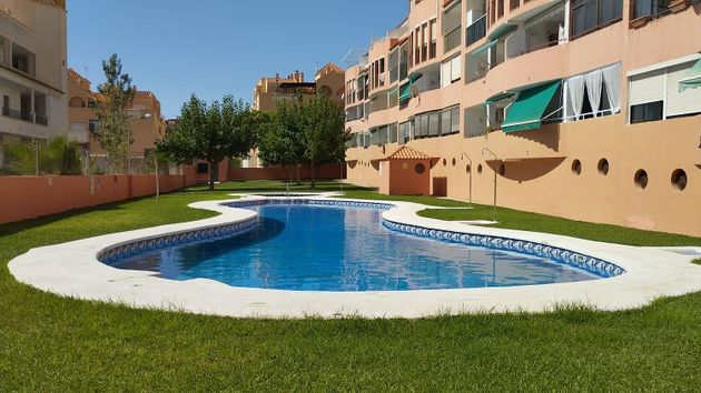 Foto 1 de Venta de piso en Aguadulce Norte de 2 habitaciones con terraza y piscina