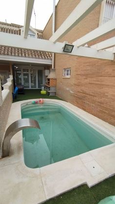 Foto 2 de Casa adosada en venta en Huércal de Almería de 5 habitaciones con terraza y piscina
