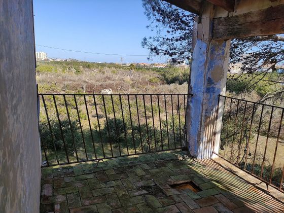 Foto 1 de Casa rural en venda a El Perelló - Les Palmeres - Mareny de Barraquetes de 5 habitacions amb terrassa i jardí