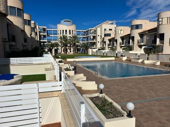 Foto 2 de Venta de casa adosada en Cabo Roig - La Zenia de 4 habitaciones con terraza y piscina