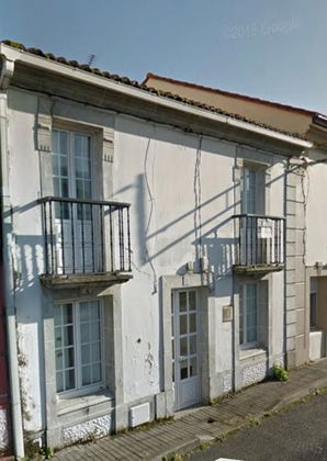 Foto 1 de Casa adossada en venda a calle Aldea o Roxal de 4 habitacions amb garatge i jardí