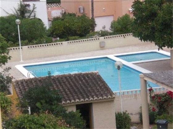 Foto 1 de Venta de casa adosada en El Perelló - Les Palmeres - Mareny de Barraquetes de 6 habitaciones con terraza y piscina