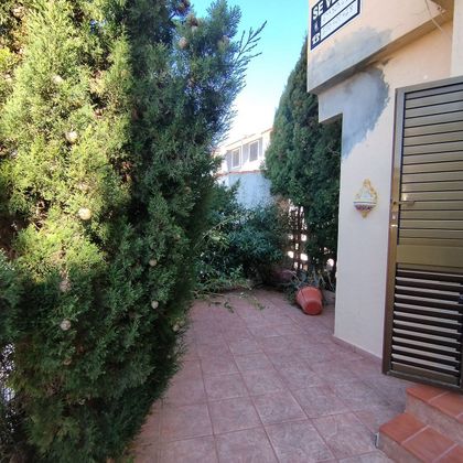 Foto 1 de Venta de casa adosada en El Perelló - Les Palmeres - Mareny de Barraquetes de 3 habitaciones con terraza y garaje