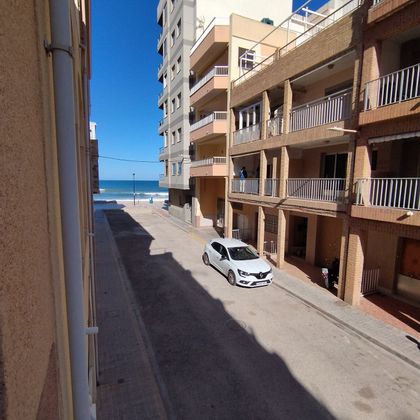 Foto 2 de Venta de piso en El Perelló - Les Palmeres - Mareny de Barraquetes de 2 habitaciones con terraza