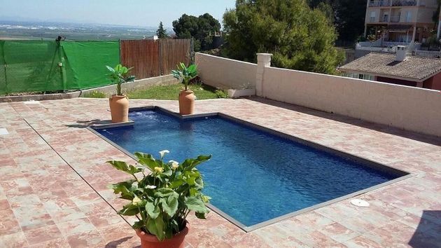 Foto 1 de Xalet en venda a Sierra Perenchiza - Cumbres de Calicanto - Santo Domingo de 4 habitacions amb terrassa i piscina