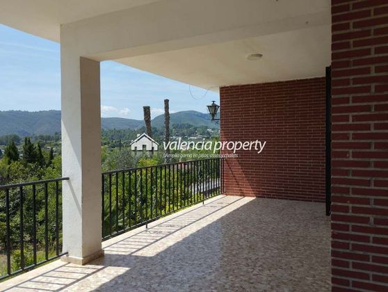Foto 2 de Casa adosada en venta en Xàtiva de 6 habitaciones con terraza y piscina