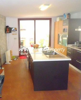 Foto 2 de Casa adosada en venta en Xàtiva de 3 habitaciones con terraza y garaje