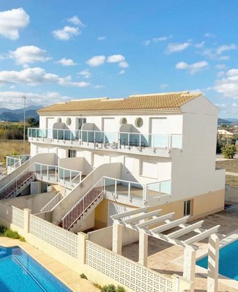 Foto 1 de Casa adossada en venda a calle De Beniarjó de 2 habitacions amb terrassa i piscina