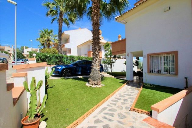 Foto 2 de Venta de casa adosada en Campos de Golf - Villa Martin - Los Dolses de 3 habitaciones con piscina y jardín