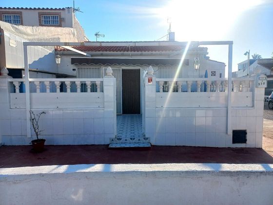 Foto 1 de Casa adossada en venda a La Siesta - El Salado - Torreta de 3 habitacions amb terrassa i aire acondicionat