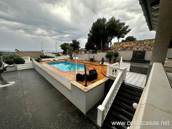 Foto 2 de Chalet en venta en Eixample Residencial de 5 habitaciones con terraza y piscina