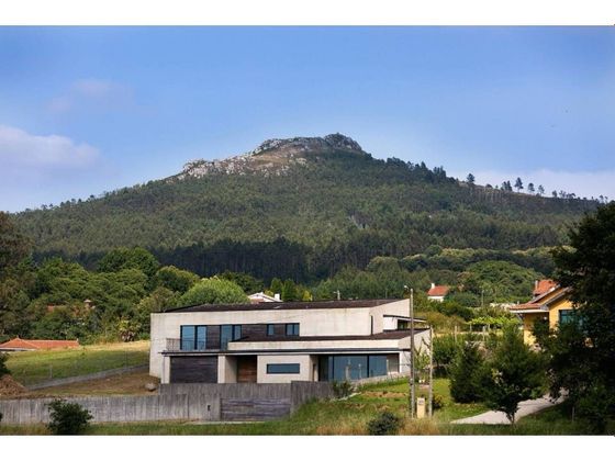 Foto 1 de Casa en venda a Boqueixón de 3 habitacions amb terrassa i piscina