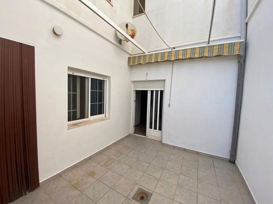 Foto 2 de Venta de casa adosada en Barxeta de 4 habitaciones con terraza y piscina