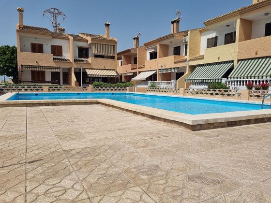 Foto 1 de Venta de casa en El Perellonet de 4 habitaciones con terraza y piscina