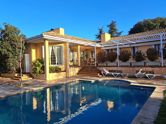 Foto 1 de Chalet en venta en Hoyo de Manzanares de 6 habitaciones con terraza y piscina