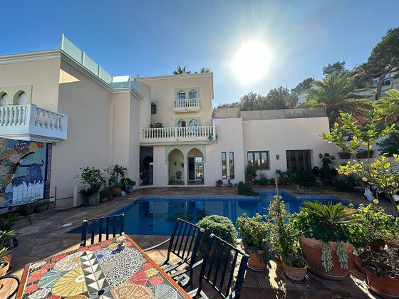 Foto 1 de Casa adossada en venda a Santa Eulalia del Río de 3 habitacions amb terrassa i piscina
