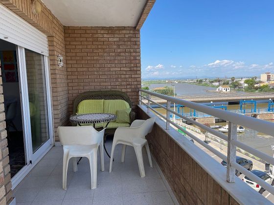 Foto 1 de Alquiler de piso en El Perelló - Les Palmeres - Mareny de Barraquetes de 4 habitaciones con terraza y muebles