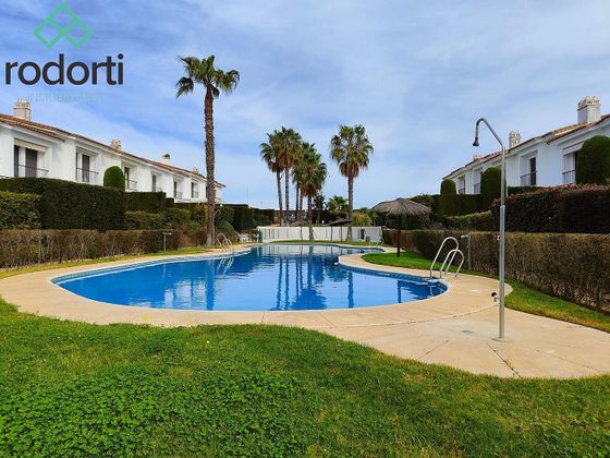 Foto 1 de Casa adossada en venda a Cartaya de 3 habitacions amb terrassa i piscina